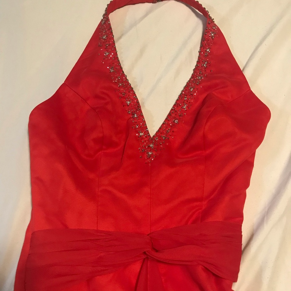 Beautiful red Rhine stones formal dress. Hi low.
